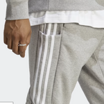Adidas Essentials French Terry Tapered Cuff 3-Streifen Hosen Herren, grau